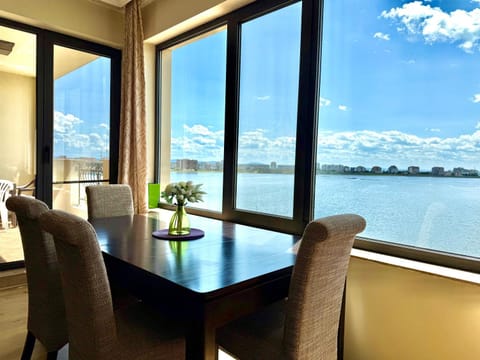 Natural landscape, View (from property/room), Living room, Dining area, Sea view