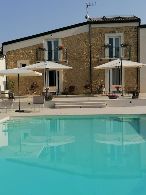 Property building, Patio, Swimming pool