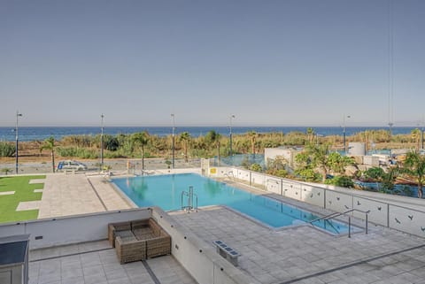 Property building, Living room, Swimming pool