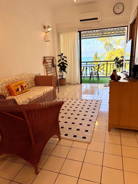 View (from property/room), Living room, Seating area, air conditioner