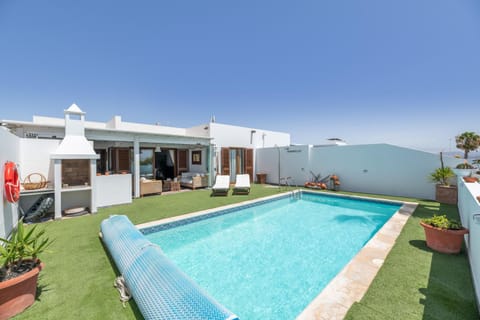 Property building, Living room, Swimming pool