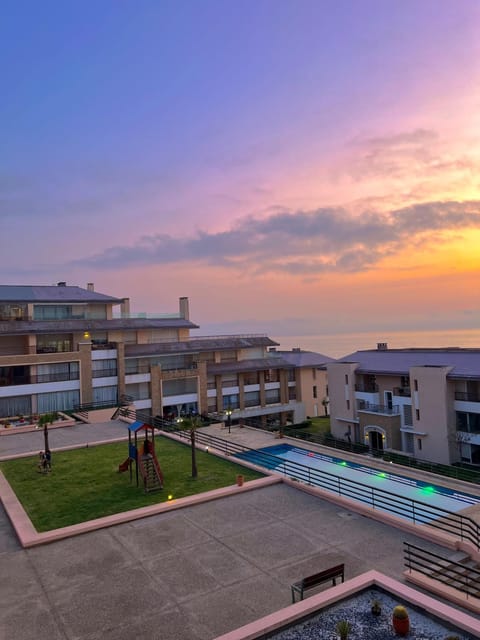 Property building, Natural landscape, Pool view, Sea view, Swimming pool, Sunset