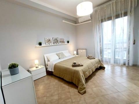 Bed, Photo of the whole room, Bedroom, towels, air conditioner