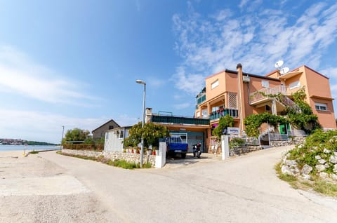 Property building, Facade/entrance, Day, Beach, Sea view, Street view, Parking