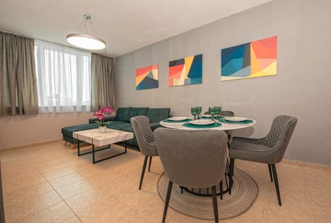 Bed, Living room, Seating area, Dining area