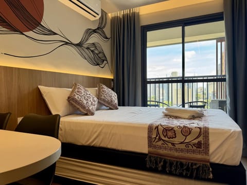 Bed, Photo of the whole room, Bedroom, towels, air conditioner