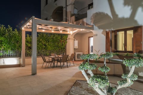 Property building, Patio, Night, Balcony/Terrace