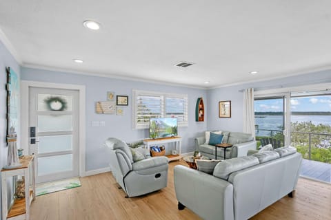 Sunset Sights Waterfront BBQ Fire Pit Dolphins House in Crescent Beach