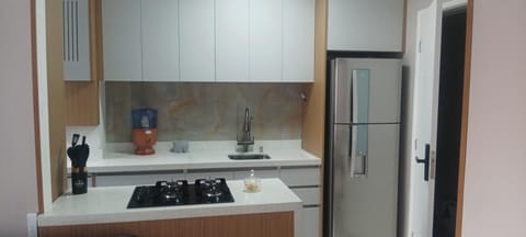 Kitchen or kitchenette, oven, stove, toaster