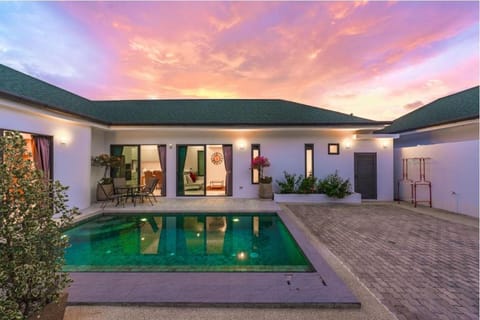 Property building, Patio, Swimming pool, sunbed