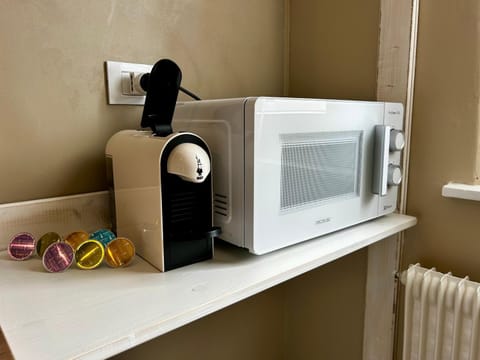 Kitchen or kitchenette, oven, toaster