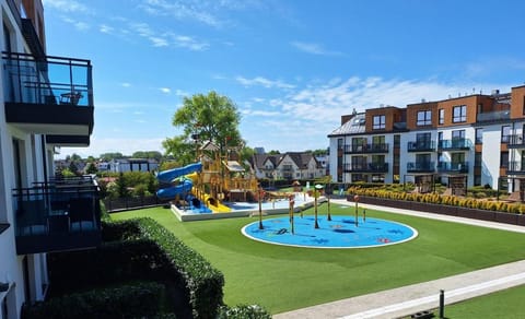 Family SUN & FUN Apartment & Water Park Patio at Belmare Aqua Resort Apartment in Miedzyzdroje
