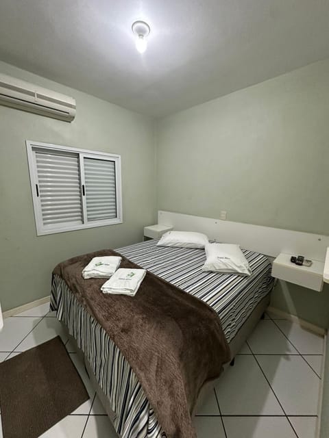 Bed, Photo of the whole room, Bedroom, towels, air conditioner