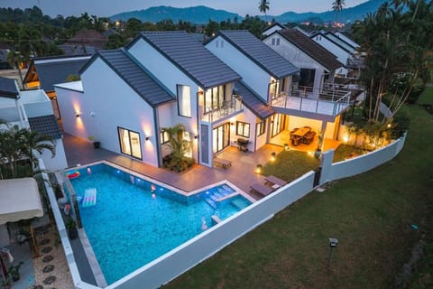 Property building, Night, Natural landscape, Mountain view, Pool view, Swimming pool, sunbed