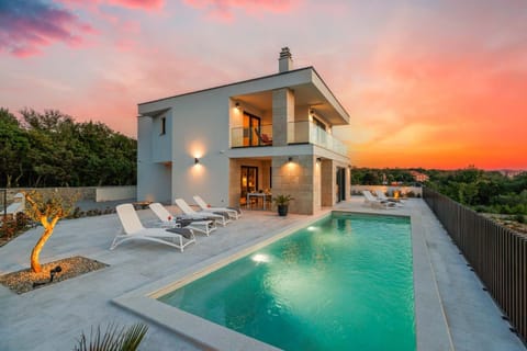 Property building, Swimming pool, Sunset, sunbed
