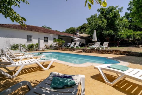 Property building, Living room, Swimming pool
