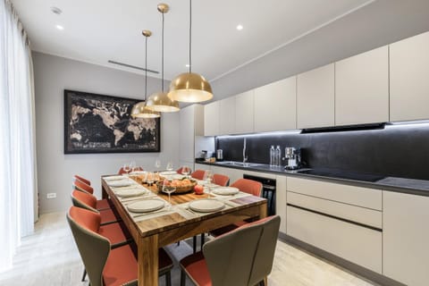 Kitchen or kitchenette, dishwasher, oven, washing machine, dryer
