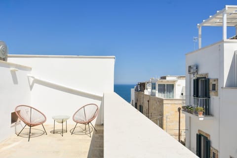 Property building, Patio, Day, Natural landscape, View (from property/room), Balcony/Terrace, Sea view, sunbed
