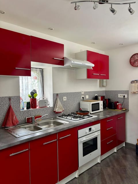 Kitchen or kitchenette, oven, stove, toaster