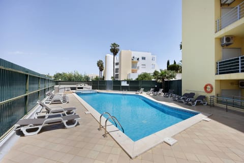 Property building, Living room, Swimming pool