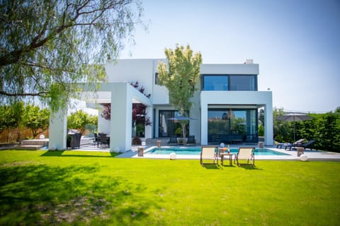 Property building, Patio, Natural landscape, Garden, Garden view, Pool view, Swimming pool, sunbed