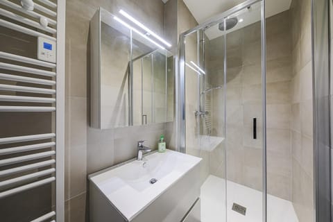 Shower, Bathroom, hair dryier, storage, towels