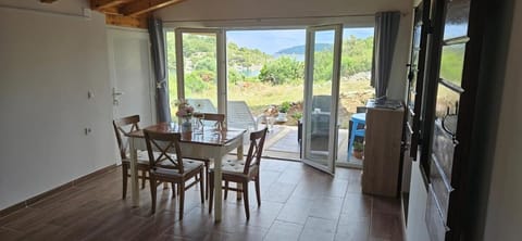 Natural landscape, View (from property/room), Living room, Seating area, Dining area