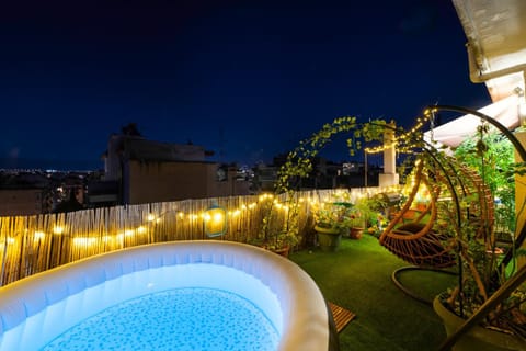 Patio, Night, Pool view, sunbed