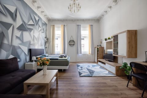 Bed, TV and multimedia, Living room, Seating area