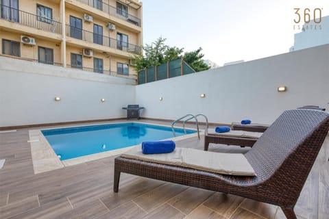 Property building, Patio, Day, Natural landscape, View (from property/room), Balcony/Terrace, Living room, Seating area, Pool view, Swimming pool, sunbed