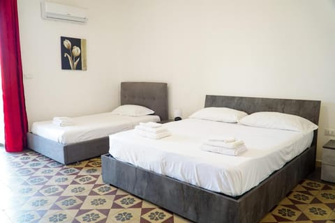 Bed, Photo of the whole room, Bedroom, towels, air conditioner