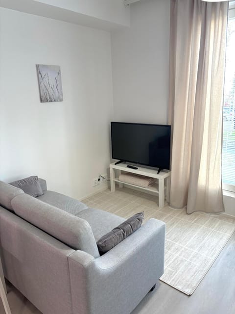 Bed, TV and multimedia, View (from property/room), Living room, Decorative detail, Seating area, Evening entertainment