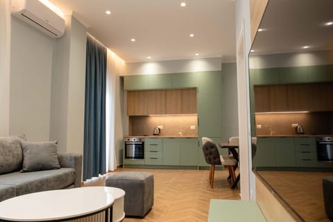 Kitchen or kitchenette, Living room, Seating area, oven, air conditioner