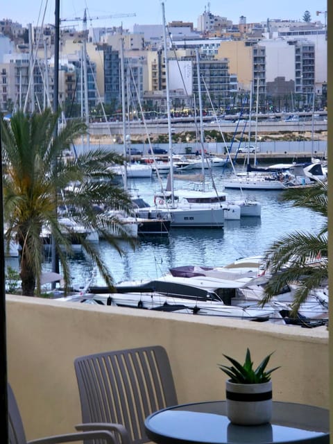 Property building, Day, View (from property/room), Balcony/Terrace, Living room, Seating area, City view, Sea view