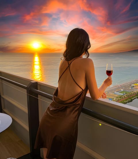 People, Natural landscape, View (from property/room), Balcony/Terrace, Food and drinks, Guests, Sea view, Drinks, Alcoholic drinks, Sunrise, Sunset, group of guests