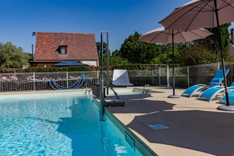 Property building, Living room, Swimming pool