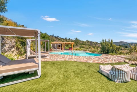 Property building, Living room, Swimming pool