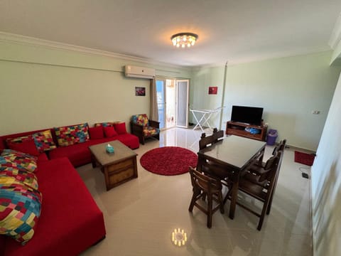 Communal lounge/ TV room, TV and multimedia, Living room, Seating area, Dining area, air conditioner