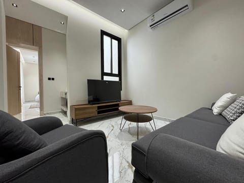 Communal lounge/ TV room, TV and multimedia, Living room, Seating area, Evening entertainment, air conditioner