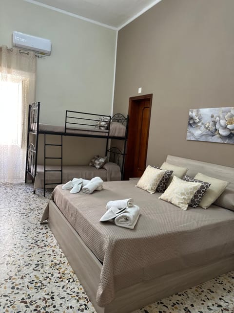 Bed, Photo of the whole room, Bedroom, towels, air conditioner