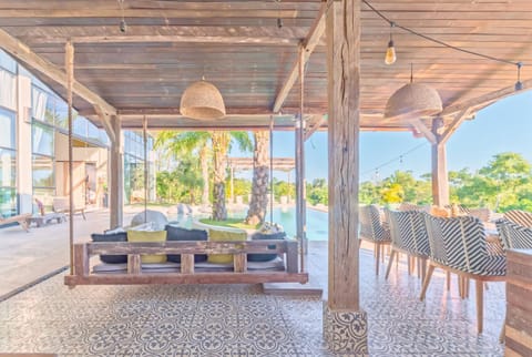 Patio, Seating area, Dining area, Pool view