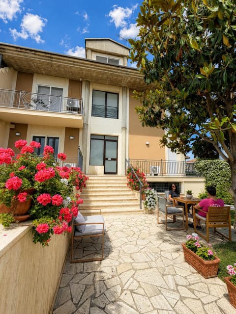 Property building, Patio, Facade/entrance, Spring, Day, Garden, View (from property/room), Balcony/Terrace, Garden view