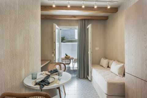 Bed, Living room, Seating area, Bedroom