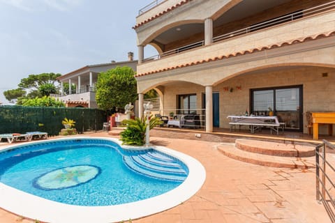Property building, Living room, Swimming pool