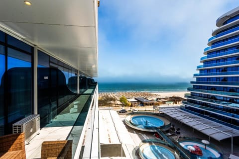 Property building, Day, Natural landscape, View (from property/room), Balcony/Terrace, Seating area, Dining area, Pool view, Sea view