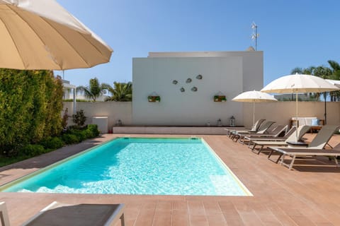 Property building, Living room, Swimming pool