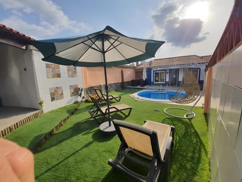 Property building, Living room, Swimming pool