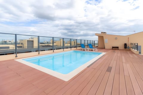 Property building, Living room, Swimming pool