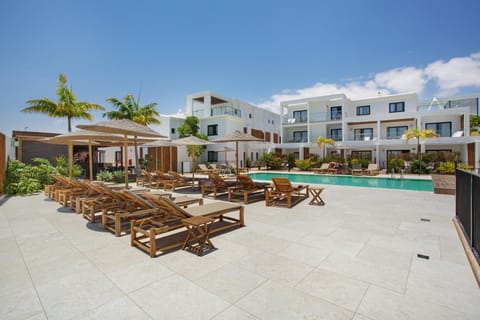 Property building, Living room, Swimming pool