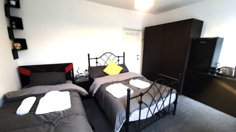 Bed, TV and multimedia, Bedroom, towels, wardrobe